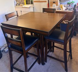Bar height dining table