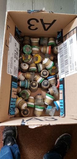 Box of old style electrical fuses