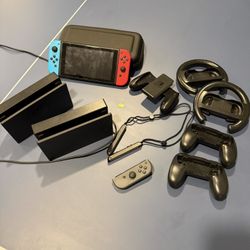 Nintendo Switch 64gb, Two Consoles, 256GB Sandisk Card, Steering Wheels 
