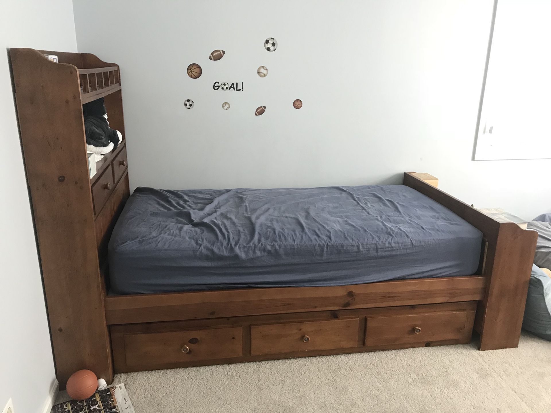 Trundle twin bed with bookshelf and headboard