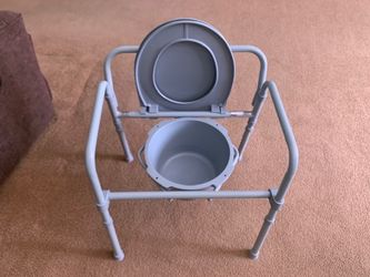 BRAND NEW BEDSIDE COMMODE