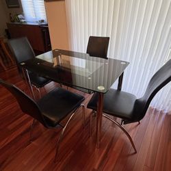 Dining Table & 4 Chairs Set Glass Faux Leather Metal Legs Kitchen Dining Room