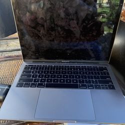 MacBook Pro Touch Bar – Likely Battery Issue – For Repair