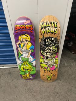 Skateboards (One with grip , one without)