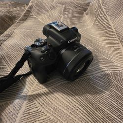 Canon EOS R50 Camera Bundle – 2 Lenses + Canon AD-E1 Adapter