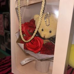 roses and a teddy bear (fake roses)