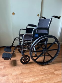 Wheelchair with foot rests