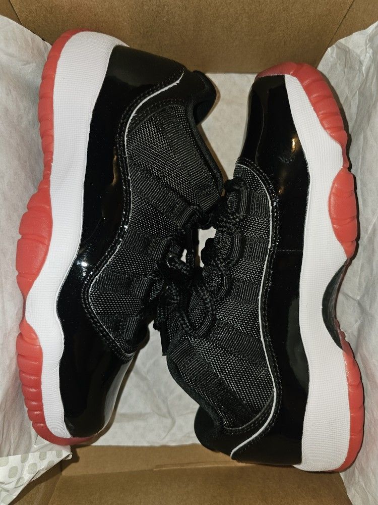 Brand New Air Jordan 11 Retro Low “Bred” – Youth Size 4Y ( NEVER WORN )