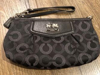 Genuine Coach wristlet with metallic hardware
