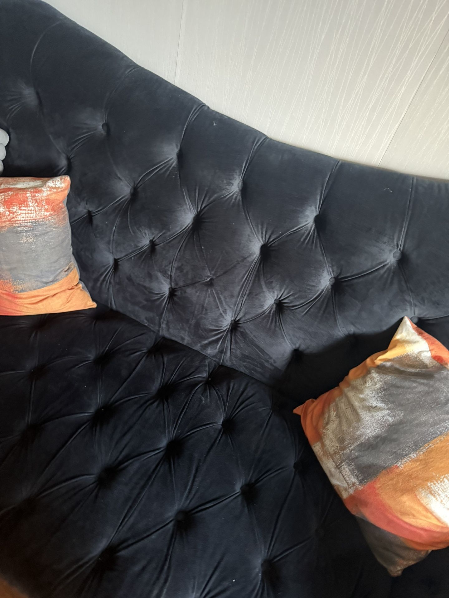 Black Couch (2) Orange Rug Included