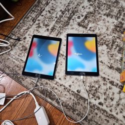 iPad Air 2 And Samsung SM-T350 Tablets