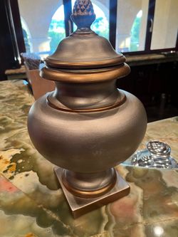silver and gold/brass colored urn style vase