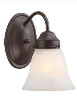Volume Lighting Barcelona Collection 1-Light Antique Bronze Wall Sconce with Alabaster Glass Bell Shade