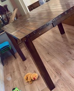 Dark wood dining table and chairs