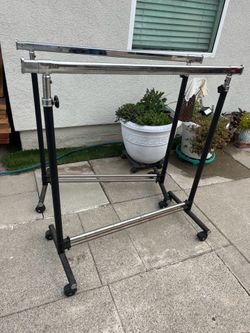 Clothes hanging racks