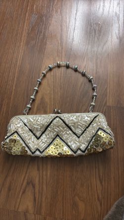 Clasped beaded bag