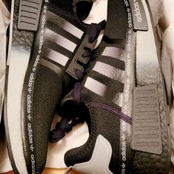 Size 10.5 Adidas NMD_R1 All Over Logo Black Gray Boost Men's GX9298.
New with box.
