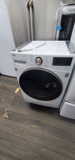 LGWasher front load great condition  warranty ready to deliver  side 27 inch 40 pound wash,,301 Saundview Ave Bronx NY 10473