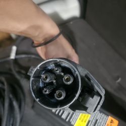 EV CHARGER PORTABLE. NEW 