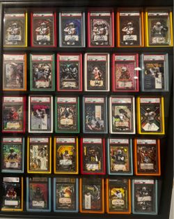 Hundreds of graded and ungraded sealed sports autos