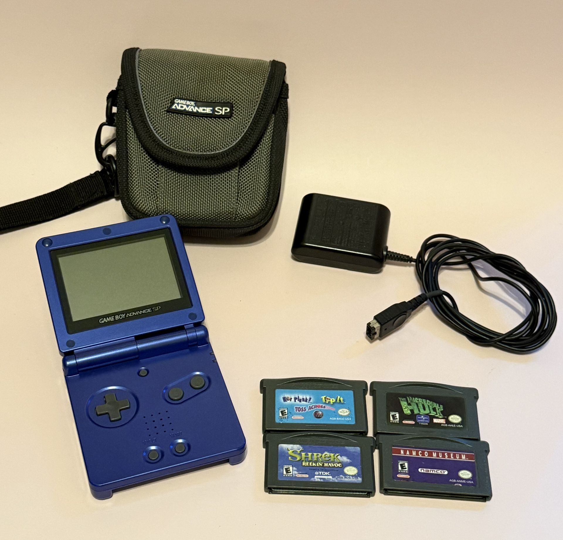 Nintendo Cobalt Blue Gameboy Advance SP. 4 Games. Charger.