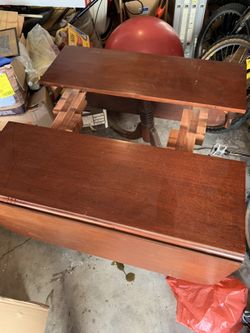 Antique sliding dining room table ..