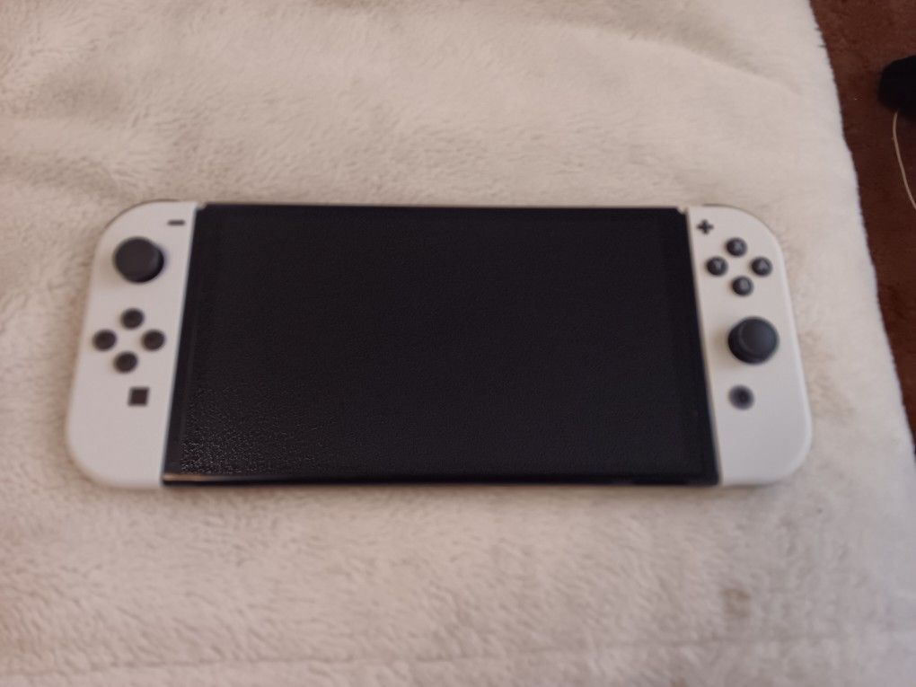 NEW NINTENDO SWITCH OLED