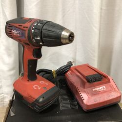 Hilti SFC 18-A CPC 18v Li-Ion compact cordless drill/driver and a Hilti C 4/36-90 battery charger.