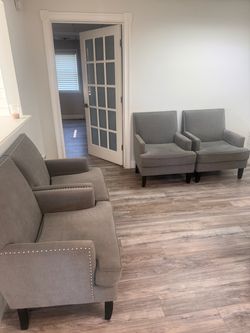 4 grey arm chairs