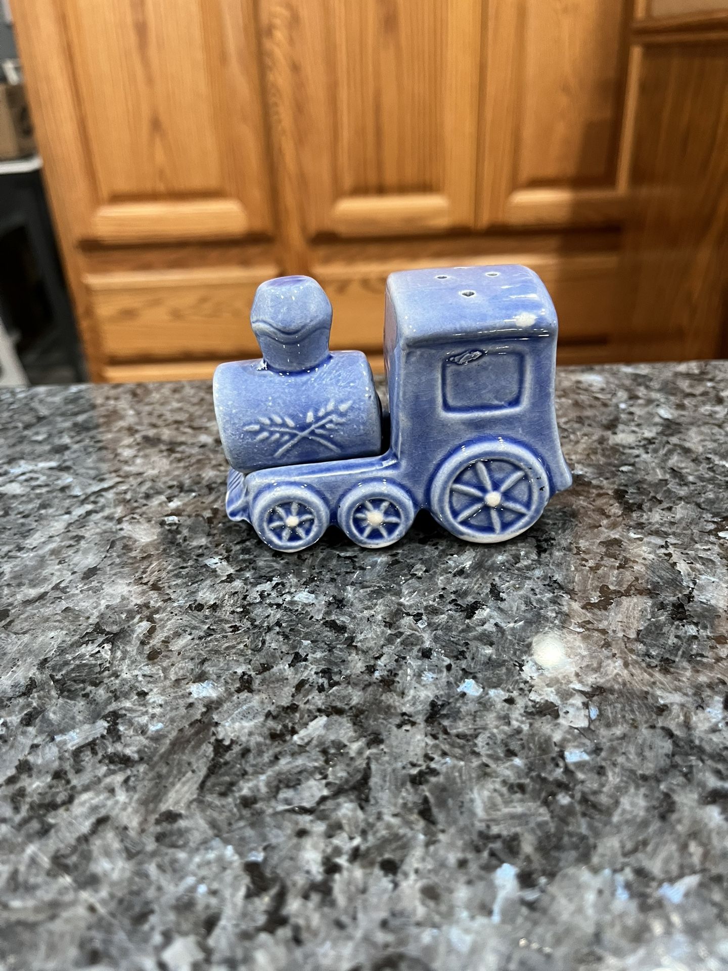 Vintage Blue Steam Engine Train pair of salt and pepper shakers. Made in Japan. Preowned with cork stoppers. Some minor pair wear. See pictures.