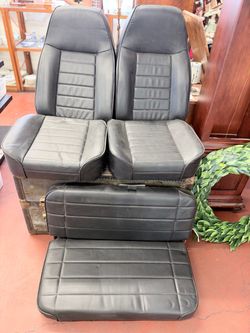 Black Leather Bucket Seats with Rear Bench