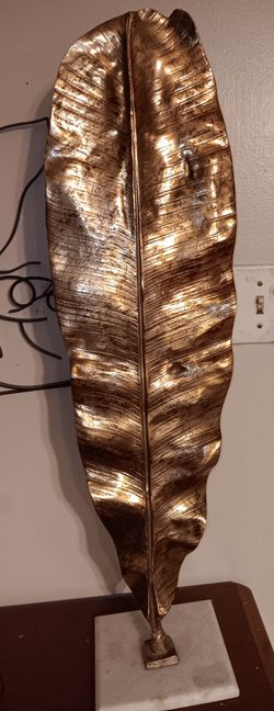 Metallic rusted sculpture leaf