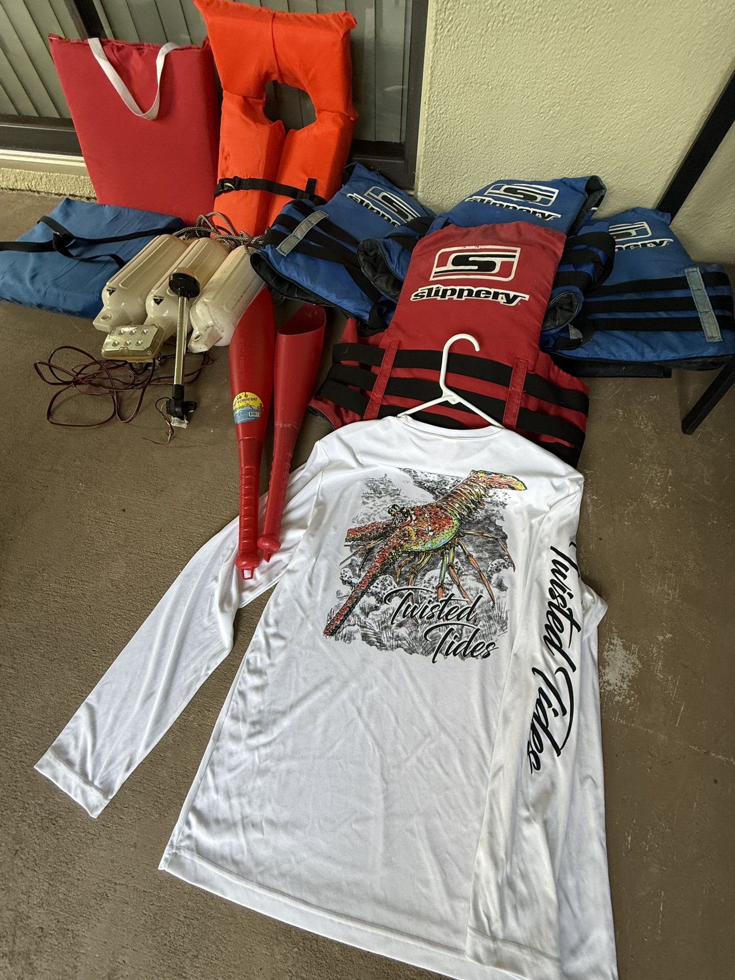 Fishing and boat items. Life jackets, boat fenders, fishing shirt, boat lights, etc… $60 for all obo