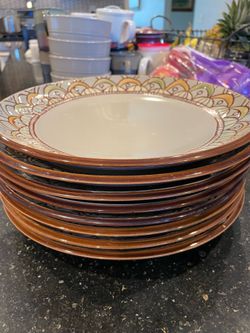 Ceramic plates, bowls and cups $10