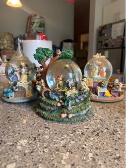Vintage Disney musical snow globes