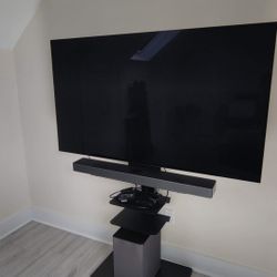 LG C2 65" TV w/ Soundbar & tv Stand  