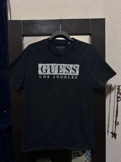 Guess T