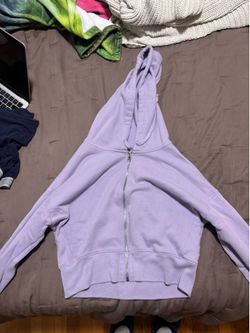 Assorted women’s tops and dresses
