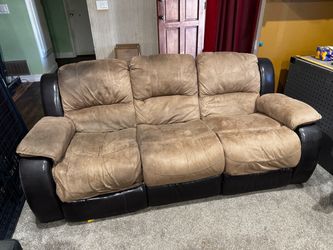 Micro fiber suede and faux leather couch. Motorized ends.
