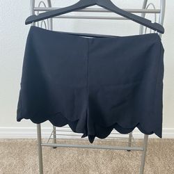 Black scallop shorts, size small