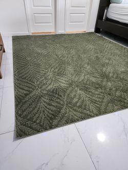 Hunter green rug 8x10