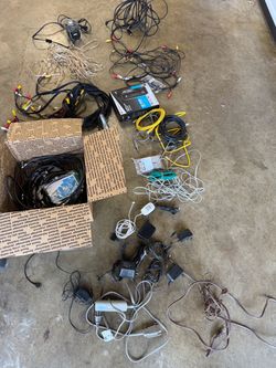 Old modem, old TV antenna, and a large assortment of cables