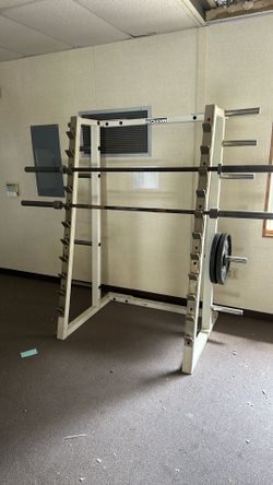 Squat rack and 2 bars and 2 50lb plates