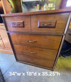 Vintage wood dresser with formica top 
34"w x 18"d x 35.25"h
From a Pet free, smoke free home