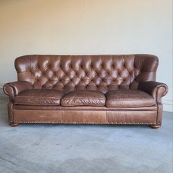 tufted/chesterfield leather sofa