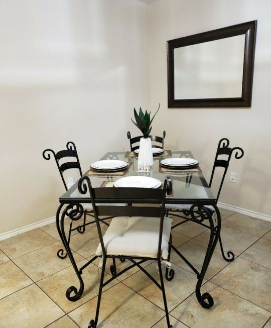 Pier One Imports Dinning Set, Consisting Of 4 Wrought Iron,  5 X 3 Rectangular Table Very Elegant And Modern "Scroll" Design 