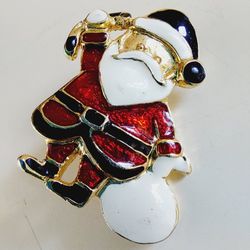 1.5" Gold Santa Claus Father Christmas with Sack of Presents Red, White & Black Enamel Brooch Lapel Pin. No markings. Pre-owned in like new condition.