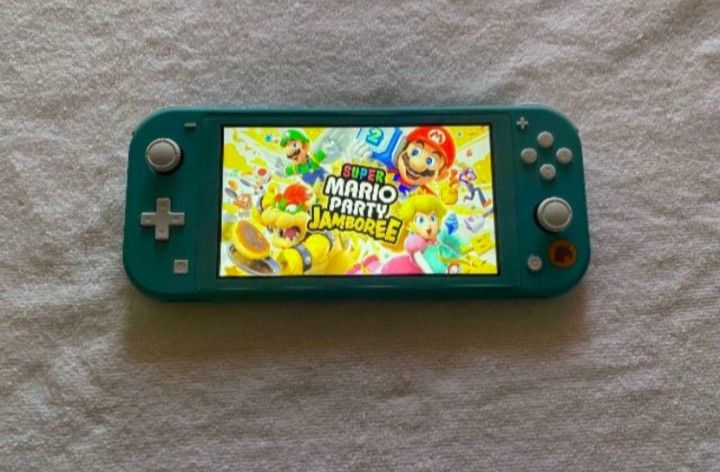 Nintendo Switch Lite WITH 120 SWITCH Games