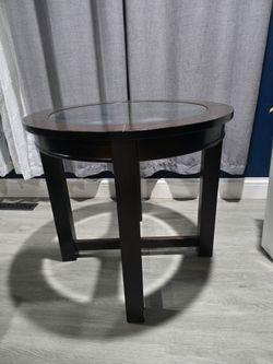 2 large round wood tables