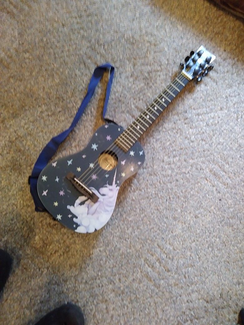 FRIST. ACT.  UNICORN.   GUITAR IN GREAT CONDITION.    